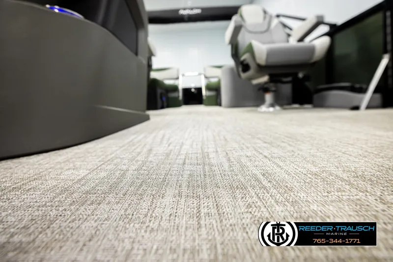 Slide: The Image of Interior view of 2026 Avalon LSZ QLS boat with textured flooring and seating. - 43