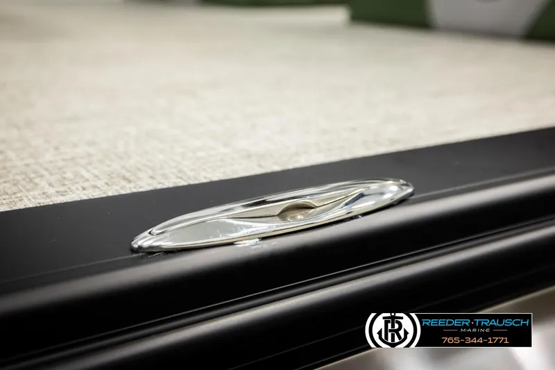 Slide: The Image of 2026 Avalon LSZ QLS boat detail with sleek chrome cleat, Reeder-Trausch Marine branding. - 48