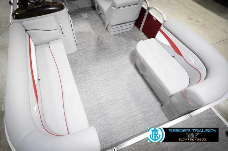 Slide: The Image of 2023 Bennington 20 SV pontoon boat interior with gray and red seating. - 13
