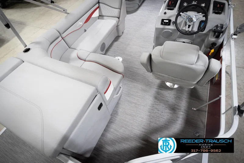 Slide: The Image of 2023 Bennington 20 SV pontoon boat interior with gray seating and steering console. - 14