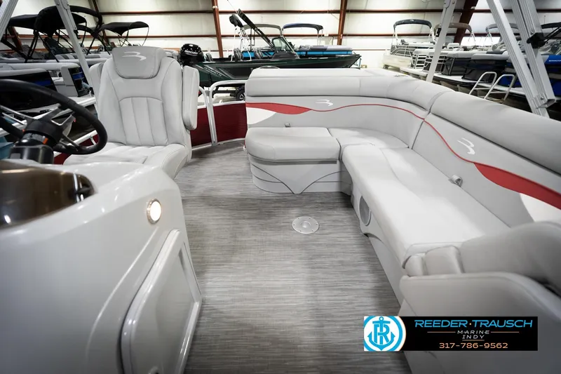Slide: The Image of 2023 Bennington 20 SV pontoon boat interior with plush seating and modern design. - 17