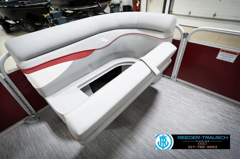 Slide: The Image of 2023 Bennington 20 SV pontoon boat interior with stylish seating and storage compartment. - 23