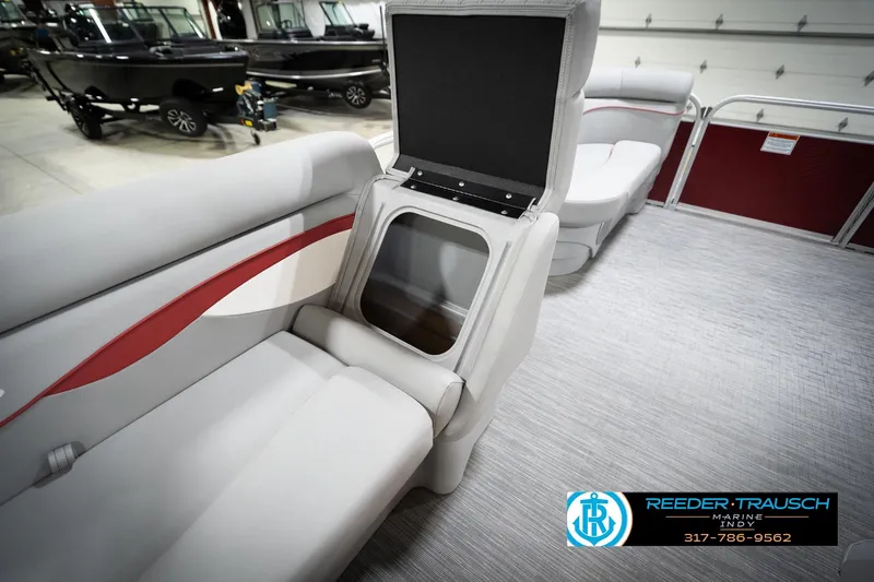 Slide: The Image of 2023 Bennington 20 SV pontoon boat interior with storage compartment open. - 33