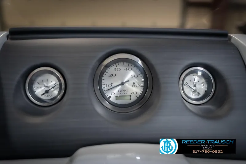 Slide: The Image of Dashboard of 2023 Bennington 20 SV boat with RPM and fuel gauges. - 39