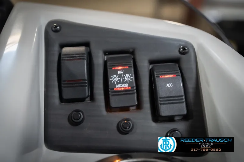 Slide: The Image of Control panel of 2023 Bennington 20 SV boat with navigation and accessory switches. - 40