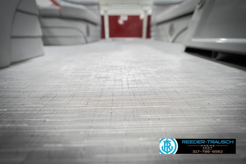 Slide: The Image of 2023 Bennington 20 SV boat interior with textured flooring, showcasing sleek seating design. - 49
