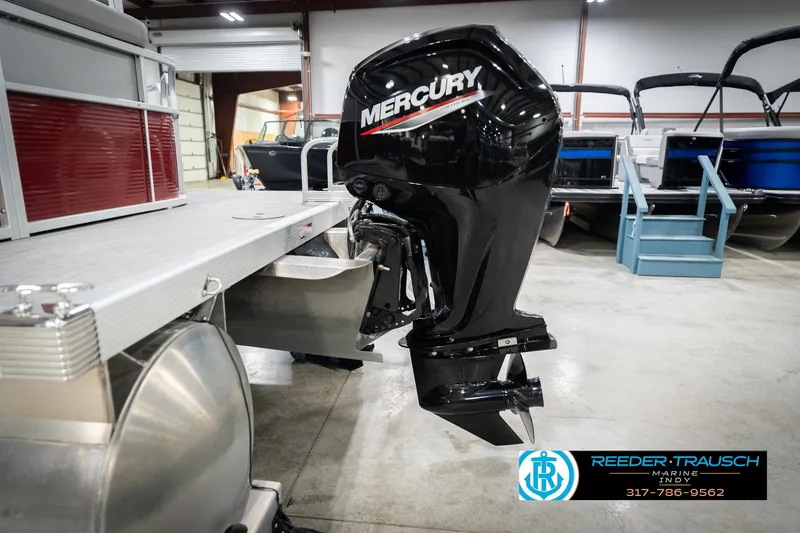 Slide: The Image of 2023 Bennington 20 SV pontoon boat with Mercury outboard motor in showroom. - 50