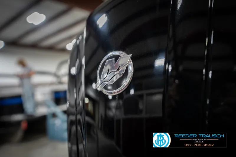 Slide: The Image of 2023 Bennington 20 SV boat with logo in focus, indoor setting, Reeder Trausch Marine. - 53