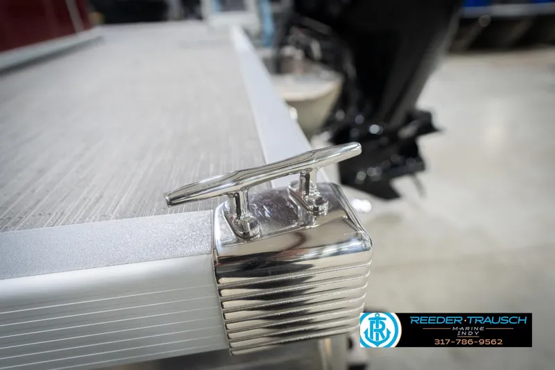 Slide: The Image of 2023 Bennington 20 SV boat cleat detail, Reeder Trausch Marine logo visible. - 58