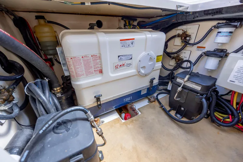 Slide: The Image of Luxurious interior of 2019 Scout 420 LXF yacht featuring kitchen and bathroom amenities. - 23