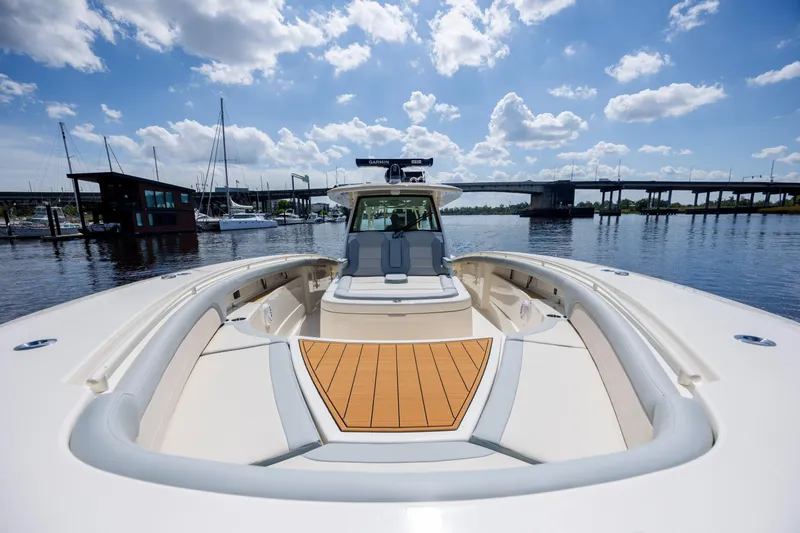 Slide: The Image of Electrical control panel inside 2019 Scout 420 LXF boat, featuring advanced navigation systems. - 43