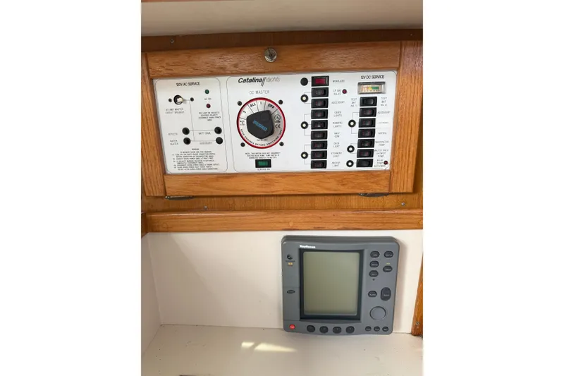 Slide: The Image of Electrical panel and navigation system on a 1999 Catalina 34 MkII sailboat. - 16