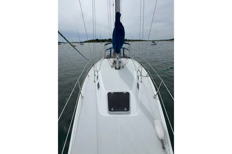 Slide: The Image of Sailboat deck view of 1999 Catalina 34 MkII on calm water. - 19