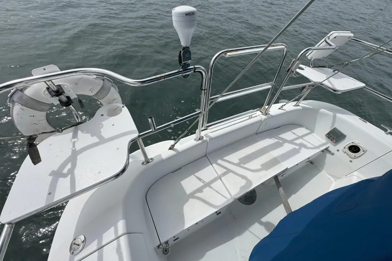 Slide: The Image of 1999 Catalina 34 MkII sailboat cockpit with seating and safety equipment. - 5