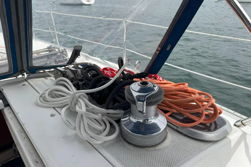 Slide: The Image of Sailing ropes and winch on 1999 Catalina 34 MkII yacht deck, with ocean view. - 8