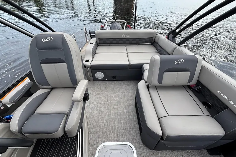 Slide: The Image of 2023 Barletta Corsa 25U boat interior with luxurious seating and modern design. - 10