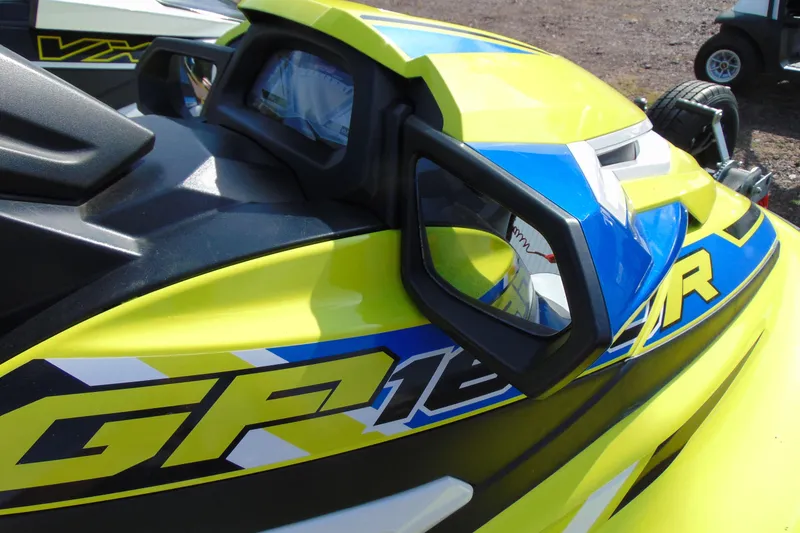 Slide: The Image of 2020 Yamaha WaveRunner GP1800R SVHO, vibrant yellow and blue design, close-up view. - 9