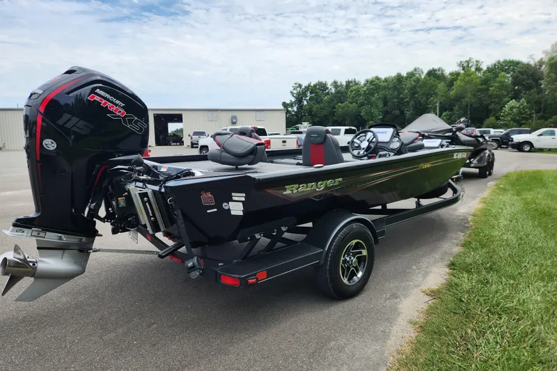Slide: The Image of 2023 Ranger RT188P boat with Mercury Pro XS engine on trailer, parked outdoors. - 4