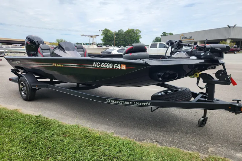 Slide: The Image of 2023 Ranger RT188P fishing boat on trailer, parked outdoors. - 6