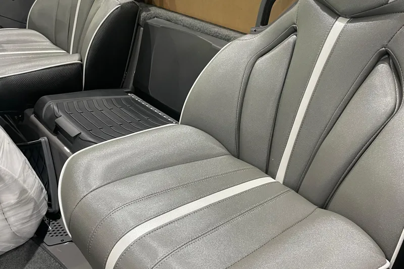 Slide: The Image of 2026 Skeeter ZXE20 boat interior with gray and white cushioned seats. - 3