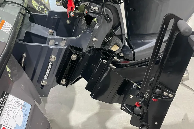 Slide: The Image of Close-up of 2026 Skeeter ZXE20 boat motor mount and components. - 5