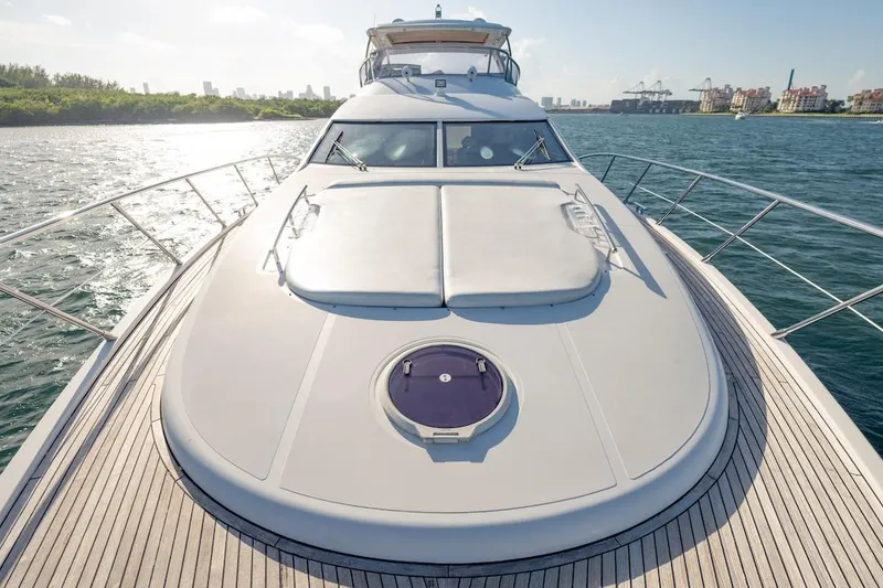 Slide: The Image of Luxurious 2012 Azimut Evolution yacht cruising on a sunny day, showcasing sleek design. - 21