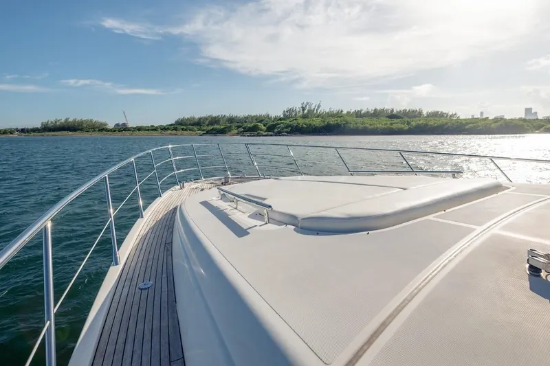 Slide: The Image of Luxurious 2012 Azimut Evolution yacht deck with scenic water view. - 23