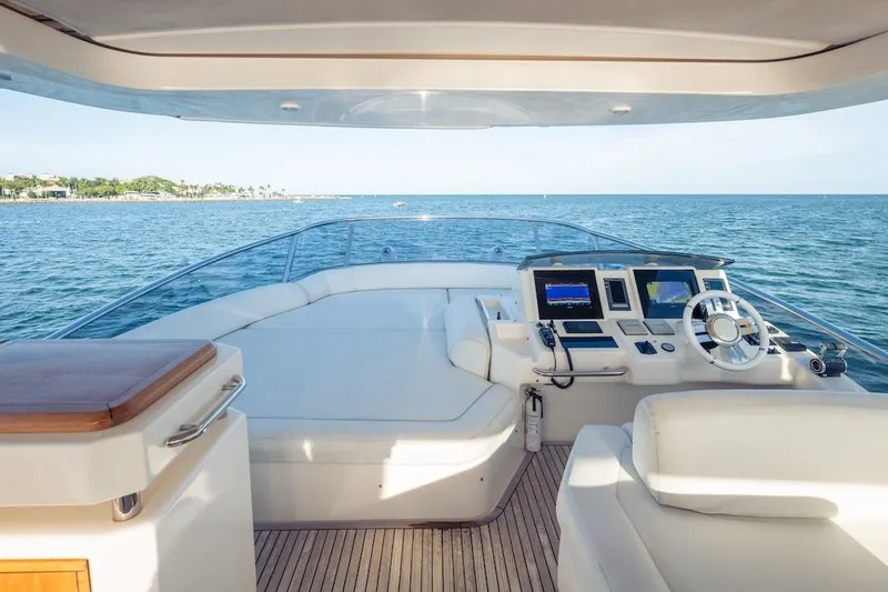 Slide: The Image of Luxurious 2012 Azimut Evolution yacht helm with ocean view and modern navigation equipment. - 37