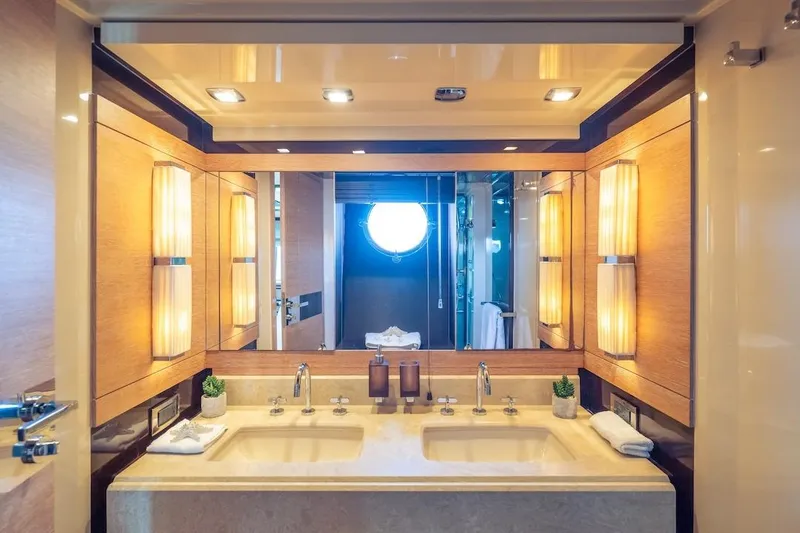 Slide: The Image of Luxurious bathroom interior of 2012 Azimut Evolution yacht with double sinks and elegant lighting. - 51