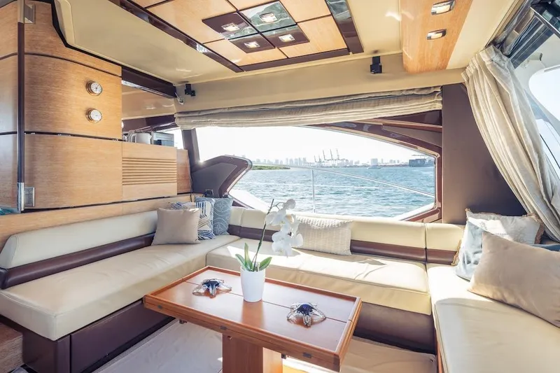 Slide: The Image of Luxurious interior of 2012 Azimut Evolution yacht with elegant seating and ocean view. - 54