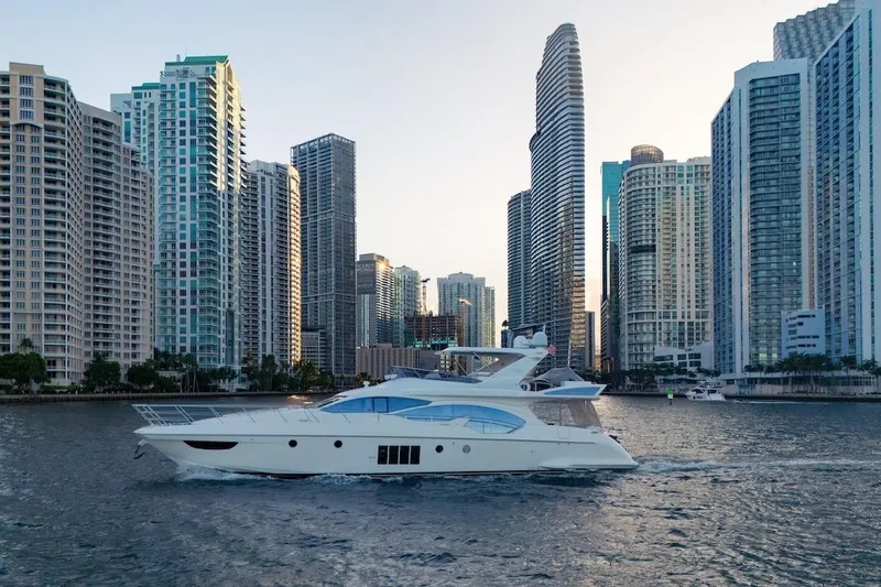 Slide: The Image of Luxury Azimut Evolution yacht cruising near city skyscrapers, 2012 model. - 7