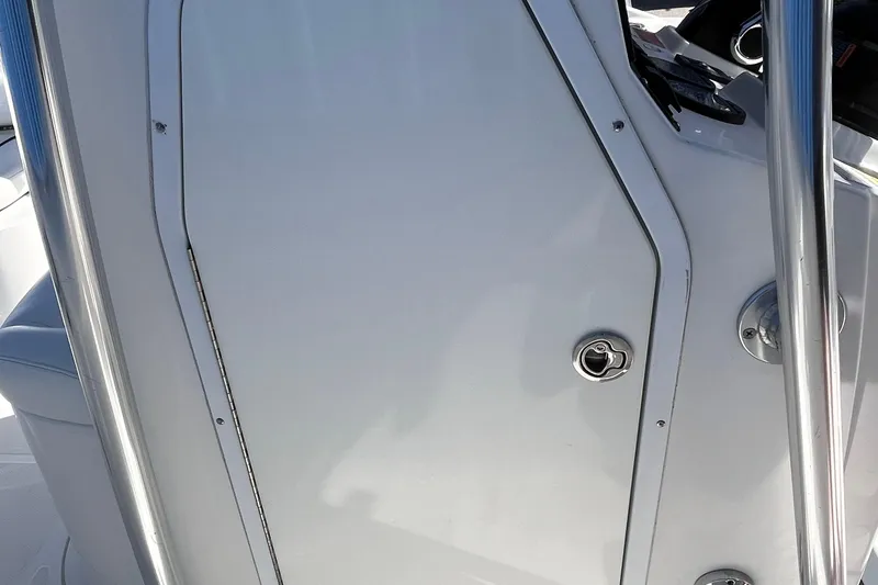 Slide: The Image of 2015 Sea Hunt Ultra 234 boat console with stainless steel railings. - 14