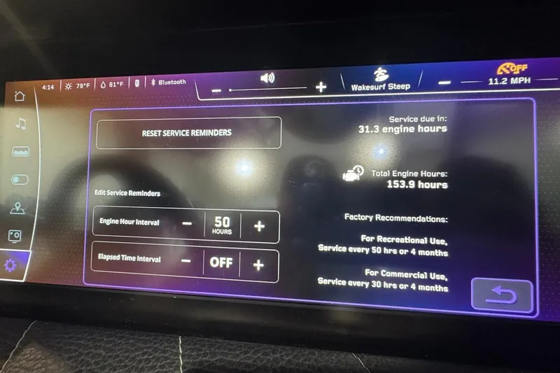 Slide: The Image of 2022 Nautique Super Air Nautique G25 interior with sleek, modern upholstery design. - 10