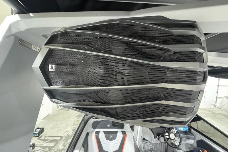 Slide: The Image of 2022 Nautique Super Air Nautique G25 interior with sleek seating and modern design. - 13