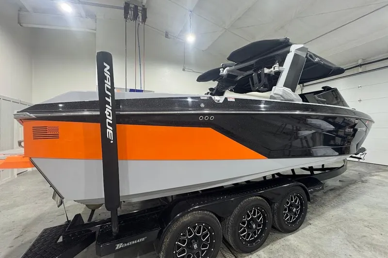 Slide: The Image of 2022 Nautique Super Air Nautique G25 interior with modern speaker system. - 5