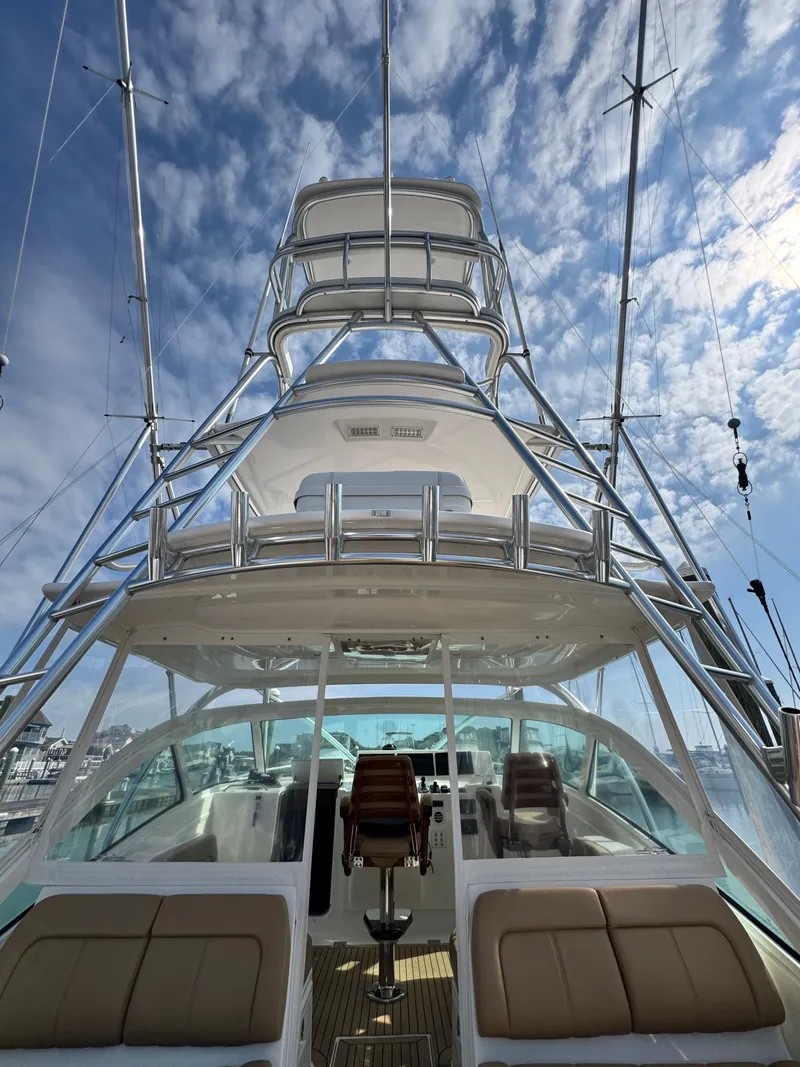 Slide: The Image of 2021 Albemarle 41 Express boat with tower against a blue sky. - 11