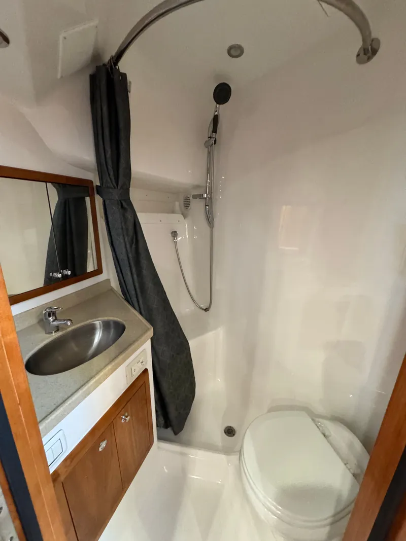 Slide: The Image of 2021 Albemarle 41 Express bathroom with shower, sink, and toilet. - 23