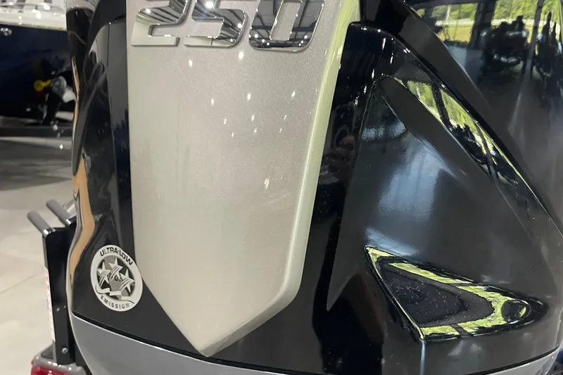 Slide: The Image of Close-up of a 2026 Skeeter FXR21 Apex boat engine with "250" and "Ultra Low Emission" badge. - 11