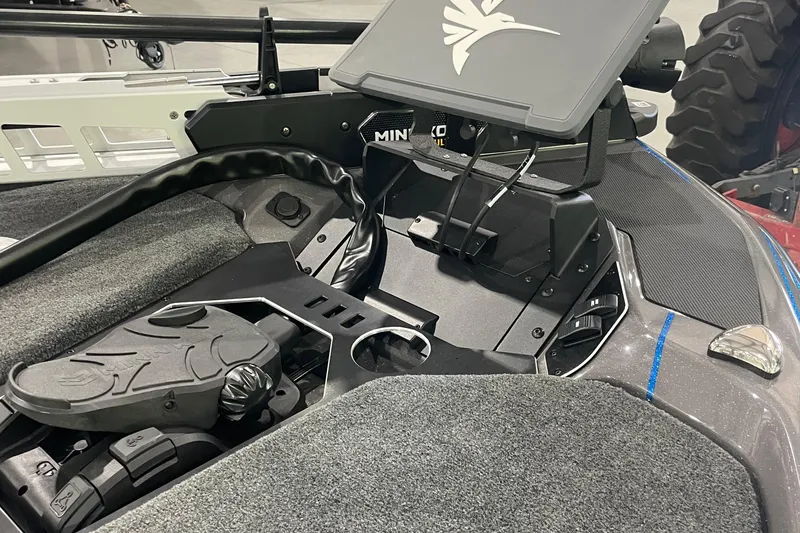 Slide: The Image of 2026 Skeeter FXR21 Apex boat dashboard with advanced controls and navigation system. - 2