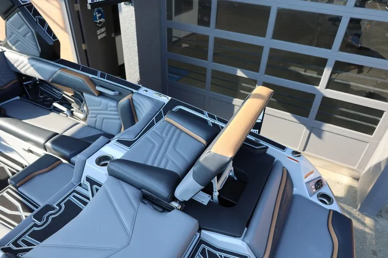 Slide: The Image of 2026 Tigé Ultré 25ZX boat interior with luxurious seating and modern design. - 18