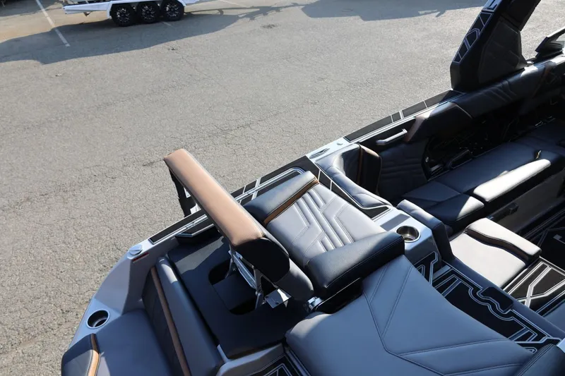 Slide: The Image of 2026 Tigé Ultré 25ZX boat interior with luxurious seating and modern design. - 19