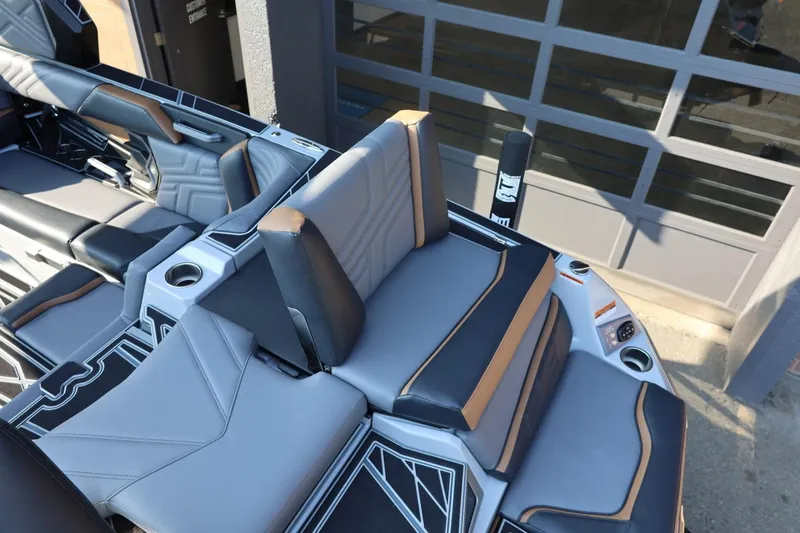 Slide: The Image of 2026 Tigé Ultré 25ZX boat interior with stylish seating and modern design. - 20