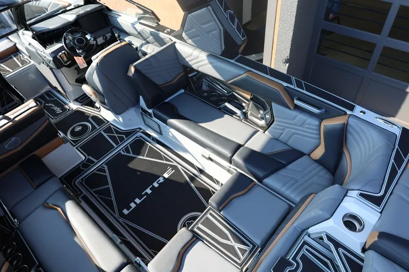 Slide: The Image of 2026 Tigé Ultré 25ZX boat interior with sleek, modern seating and stylish design. - 27