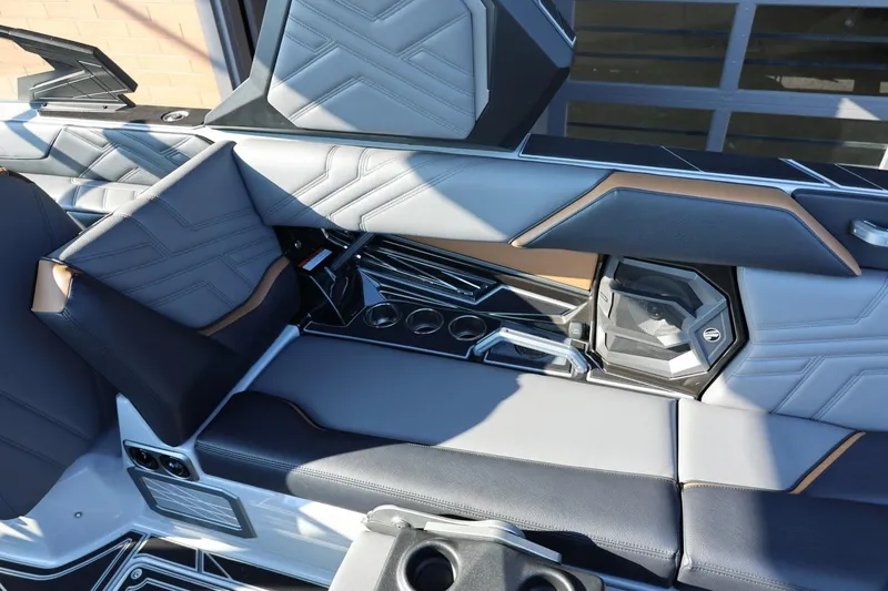 Slide: The Image of 2026 Tigé Ultré 25ZX boat interior with luxurious seating and modern design elements. - 30