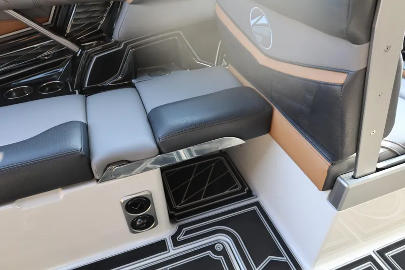 Slide: The Image of 2026 Tigé Ultré 25ZX interior seating with modern design and cup holders. - 34
