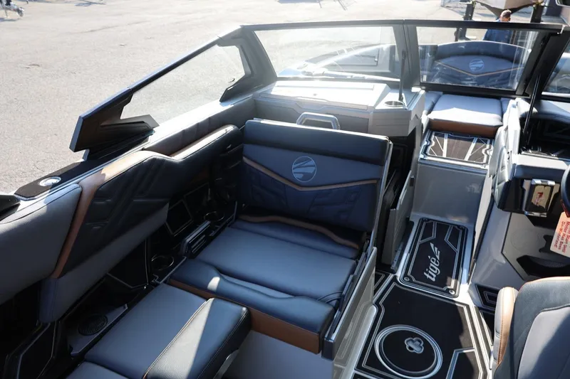 Slide: The Image of 2026 Tigé Ultré 25ZX boat interior with luxurious seating and modern design. - 37