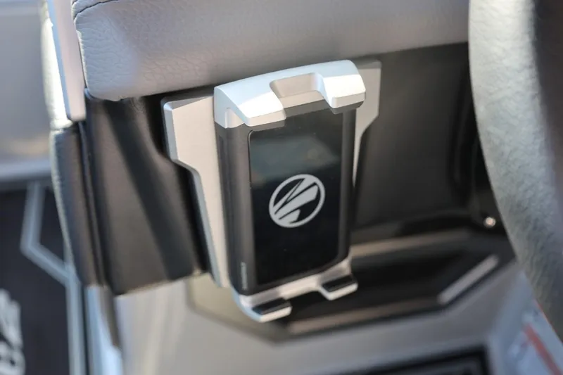 Slide: The Image of Phone holder in 2026 Tigé Ultré 25ZX boat cockpit, featuring sleek design and secure grip. - 46