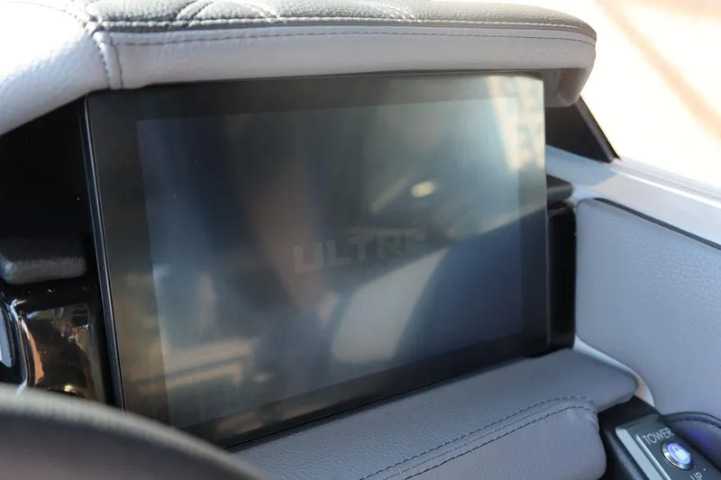 Slide: The Image of 2026 Tigé Ultré 25ZX dashboard touchscreen display with leather trim. - 49