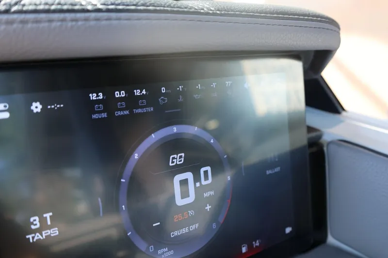 Slide: The Image of Dashboard display of 2026 Tigé Ultré 25ZX boat, showing speed and system indicators. - 51