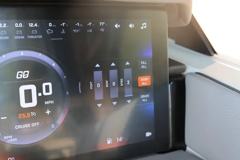 Slide: The Image of Dashboard display of 2026 Tigé Ultré 25ZX boat showing speed and control settings. - 52